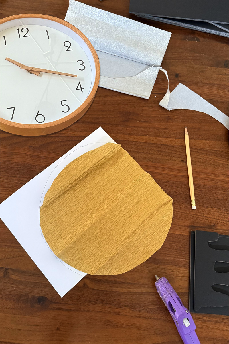 Cutting out a gold candle glow