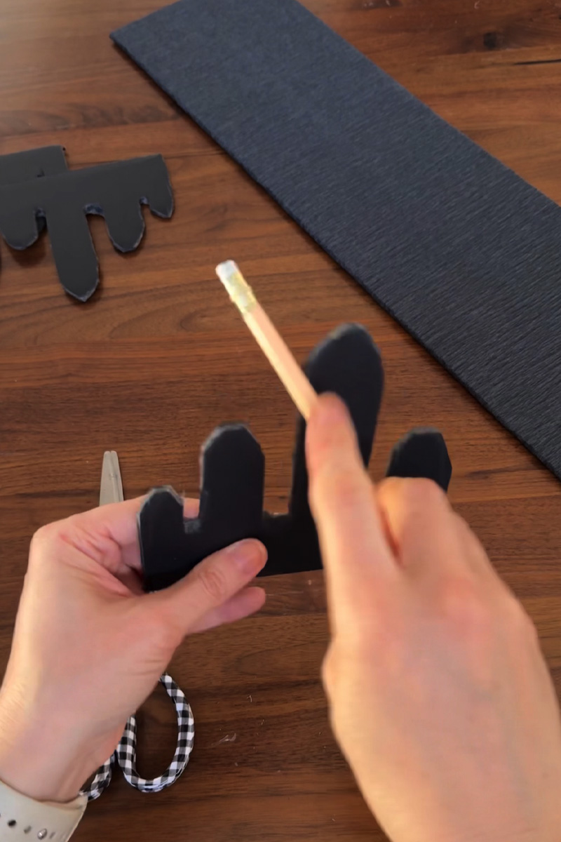 Crafting a black candle wax drip