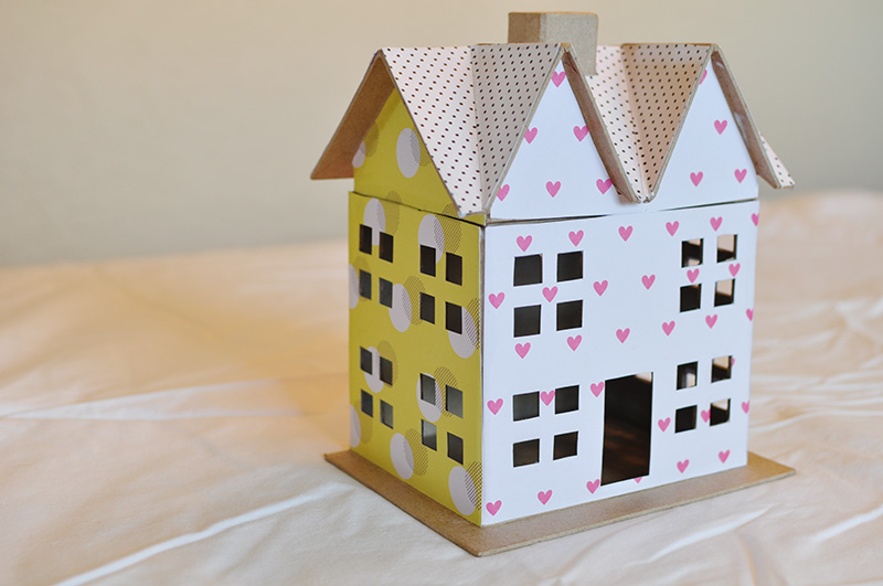 Trendy yellow and white polka dot doll house