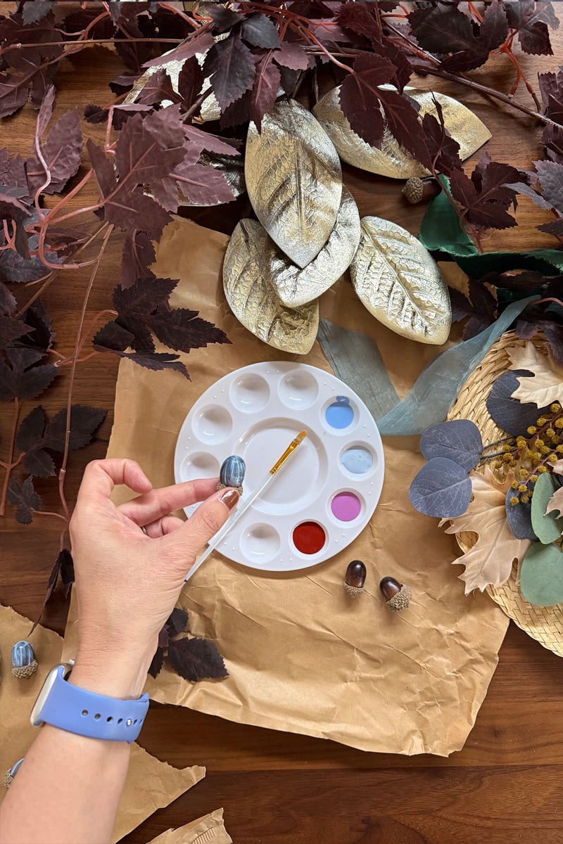 Paint palette with blues and purple paints