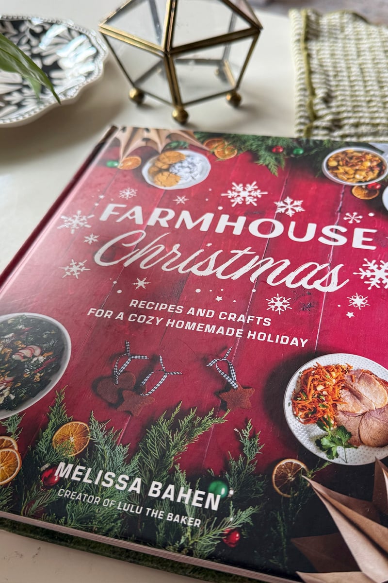 Closeup look at red Farmhouse Christmas book on coffee table
