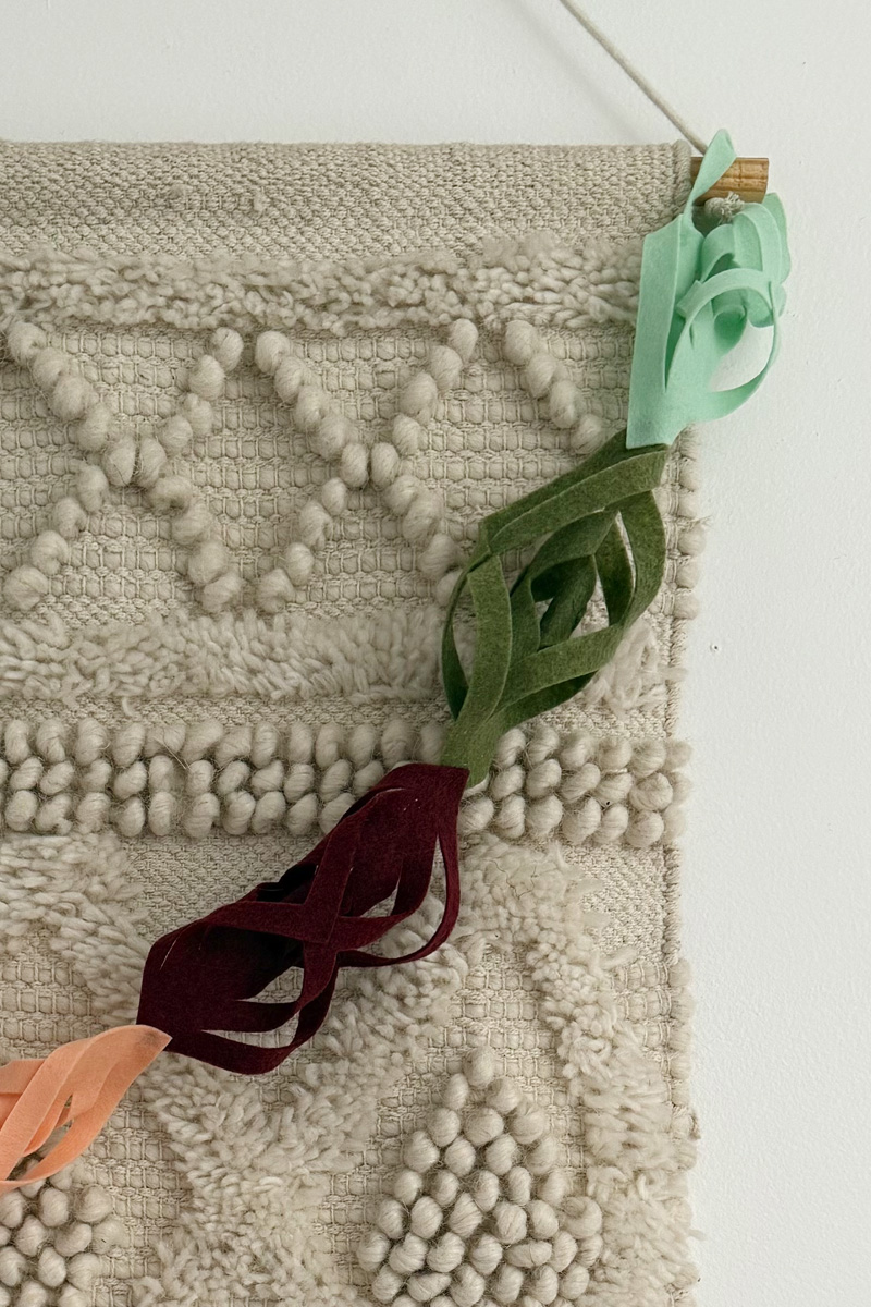 Hanging green felt garland