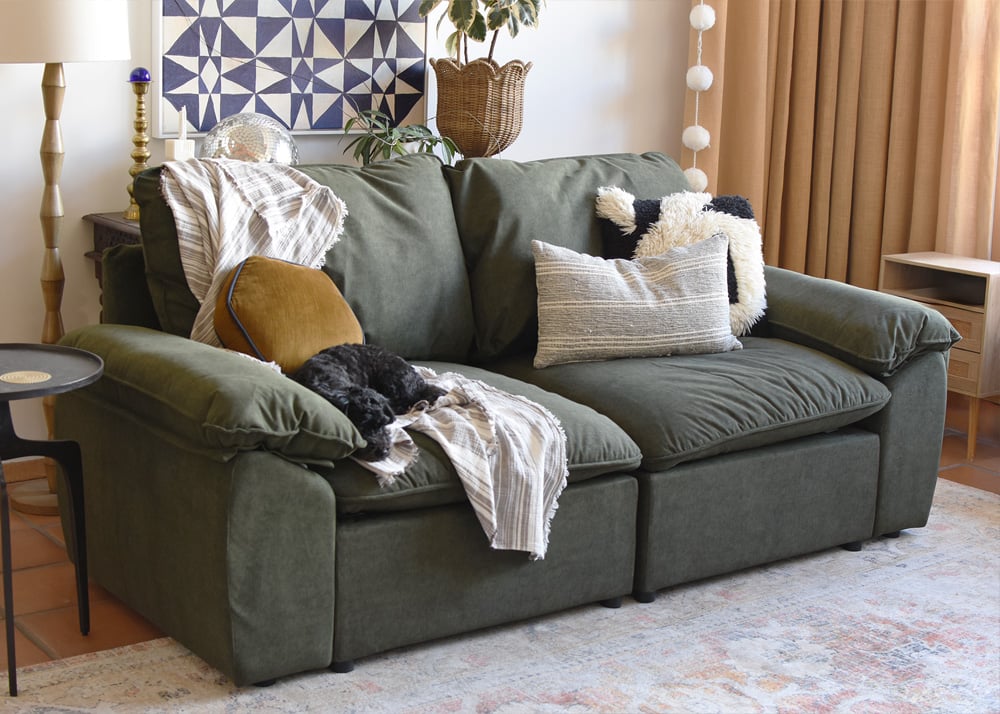 Green modular sofa in modern living room