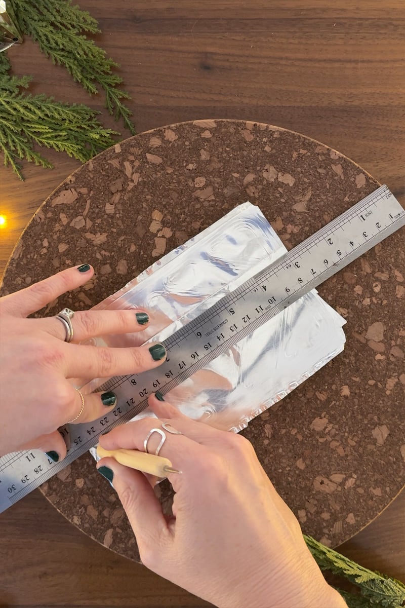 Use a ruler to measure out metal strips