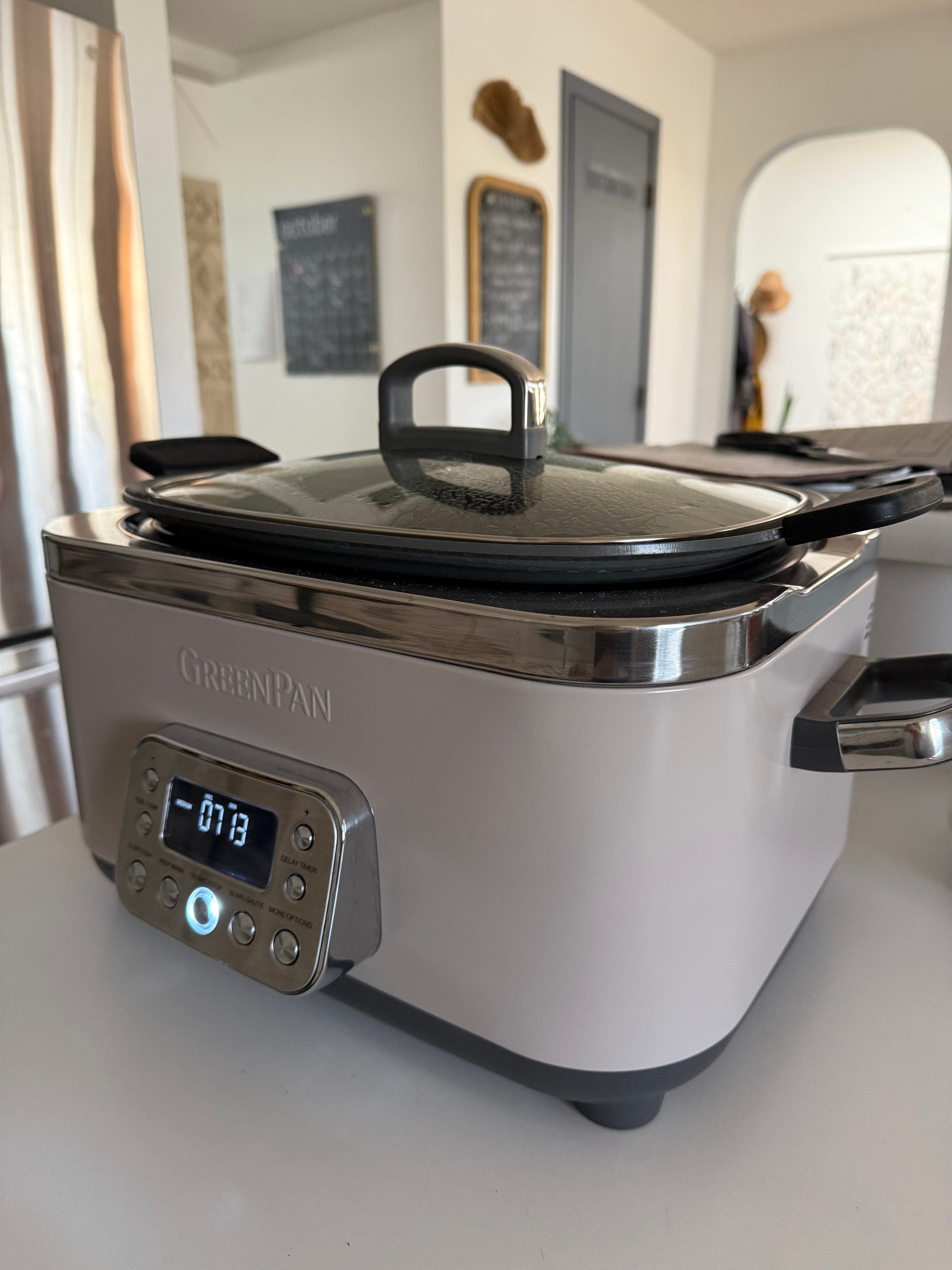 Greenpan Crock pot in clay color on white countertop in ktichen