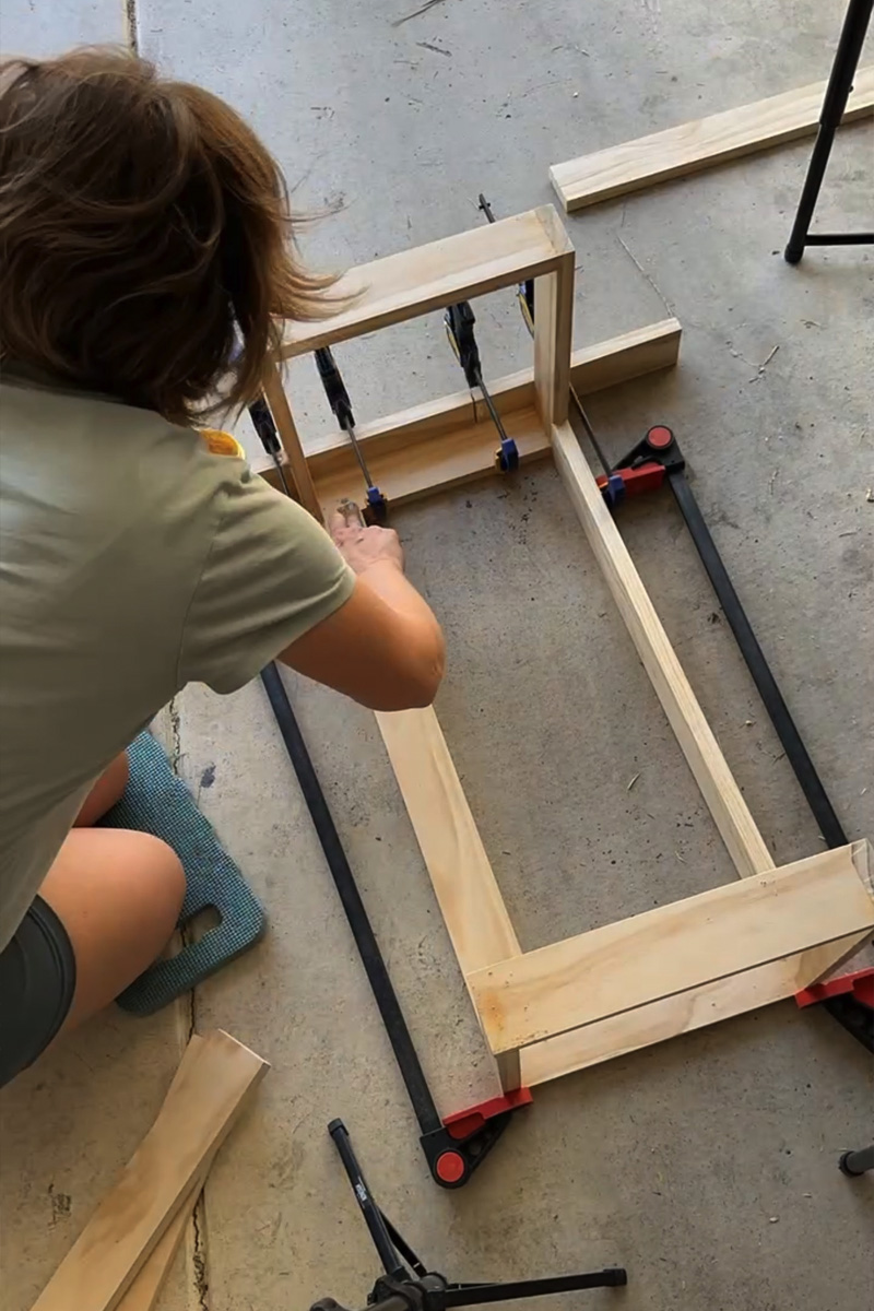 Add legs to plant stand