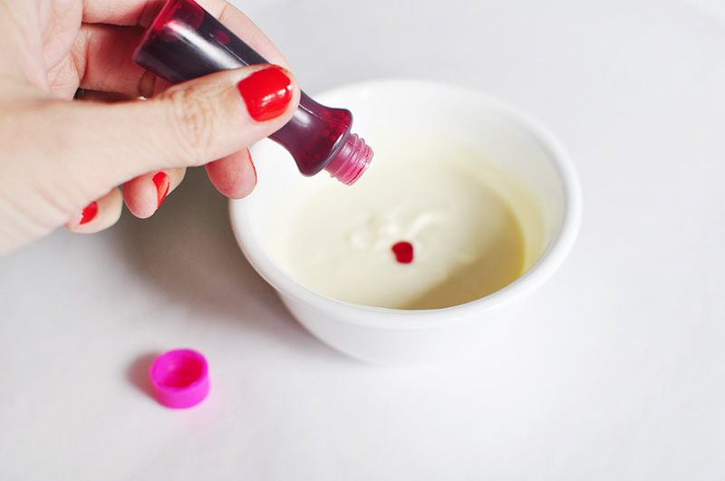 Pink food coloring in white chocolate