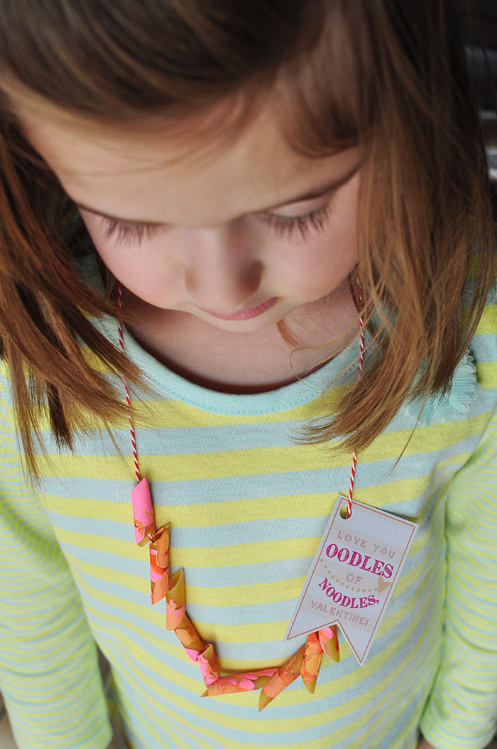 Girl wearing noodle necklace