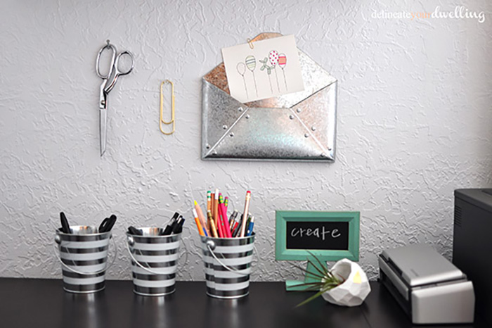 Buckets with pens and markers