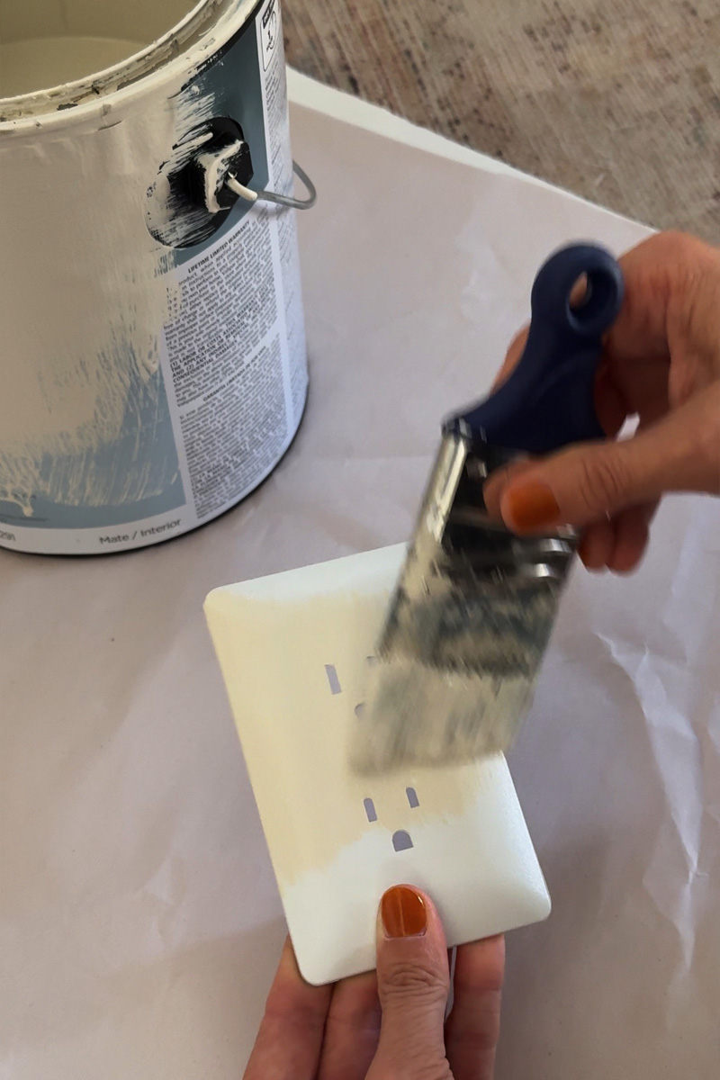 Cream paint on outlet cover