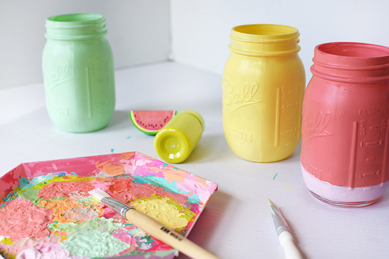 Mint green, yellow and red painted jars