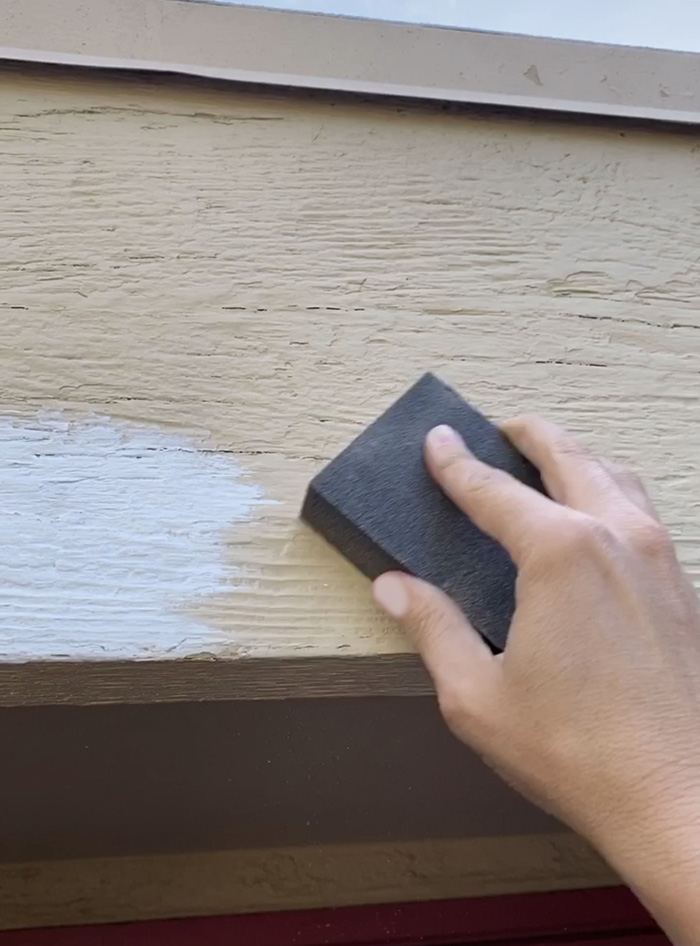 Sand down a garage door