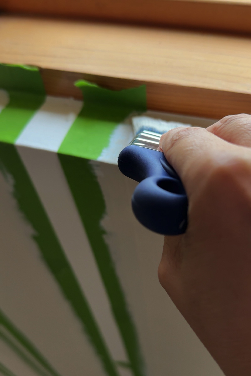 Wooster hand held paint brush