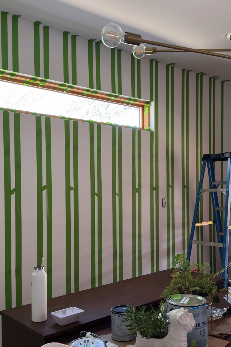 Green painter's tape stripes on wall