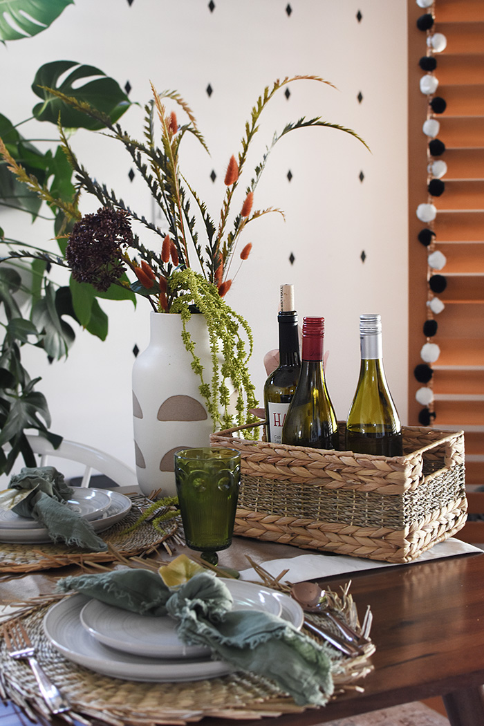 Wine Bottles in Basket Thanksgiving Table