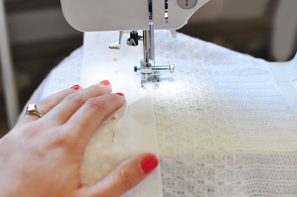 Sewing trim on blanket