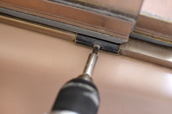 Sliding Glass Door Removal - removing frame screws