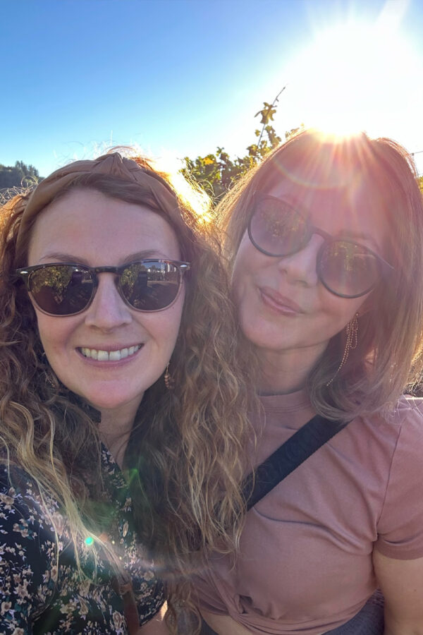 Two sisters at a wine tasting in Healdsburg, CA