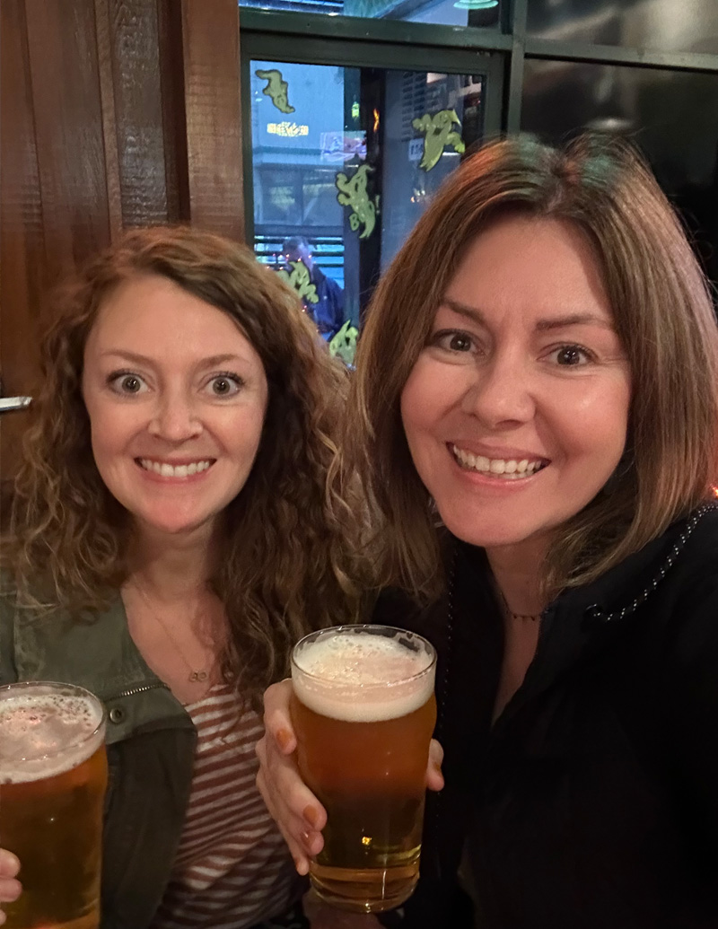 Two women enjoying a beer at Russian River Brewing Company in Santa Rosa, CA