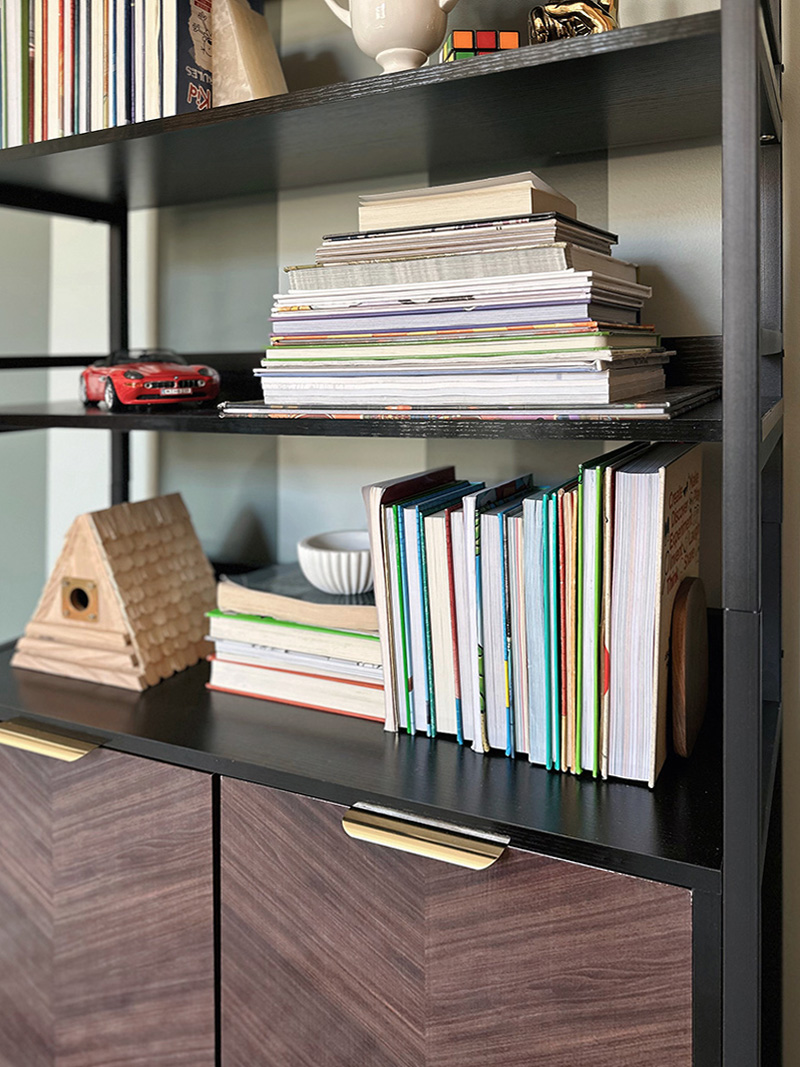 Stacked books on bookshelf