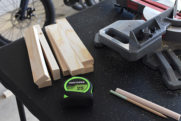 Wood pile with measuring tape