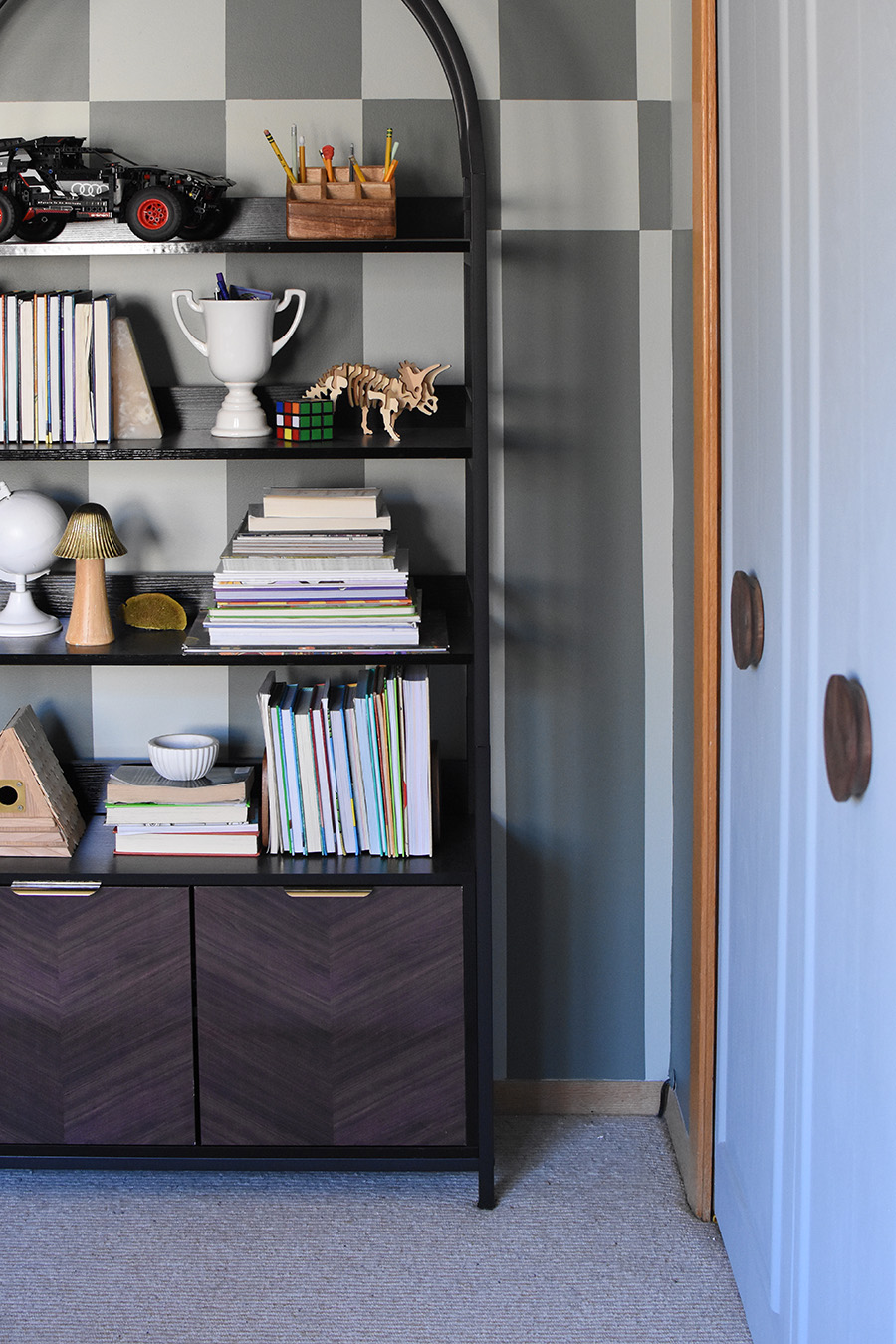 Arched bookshelf full of books