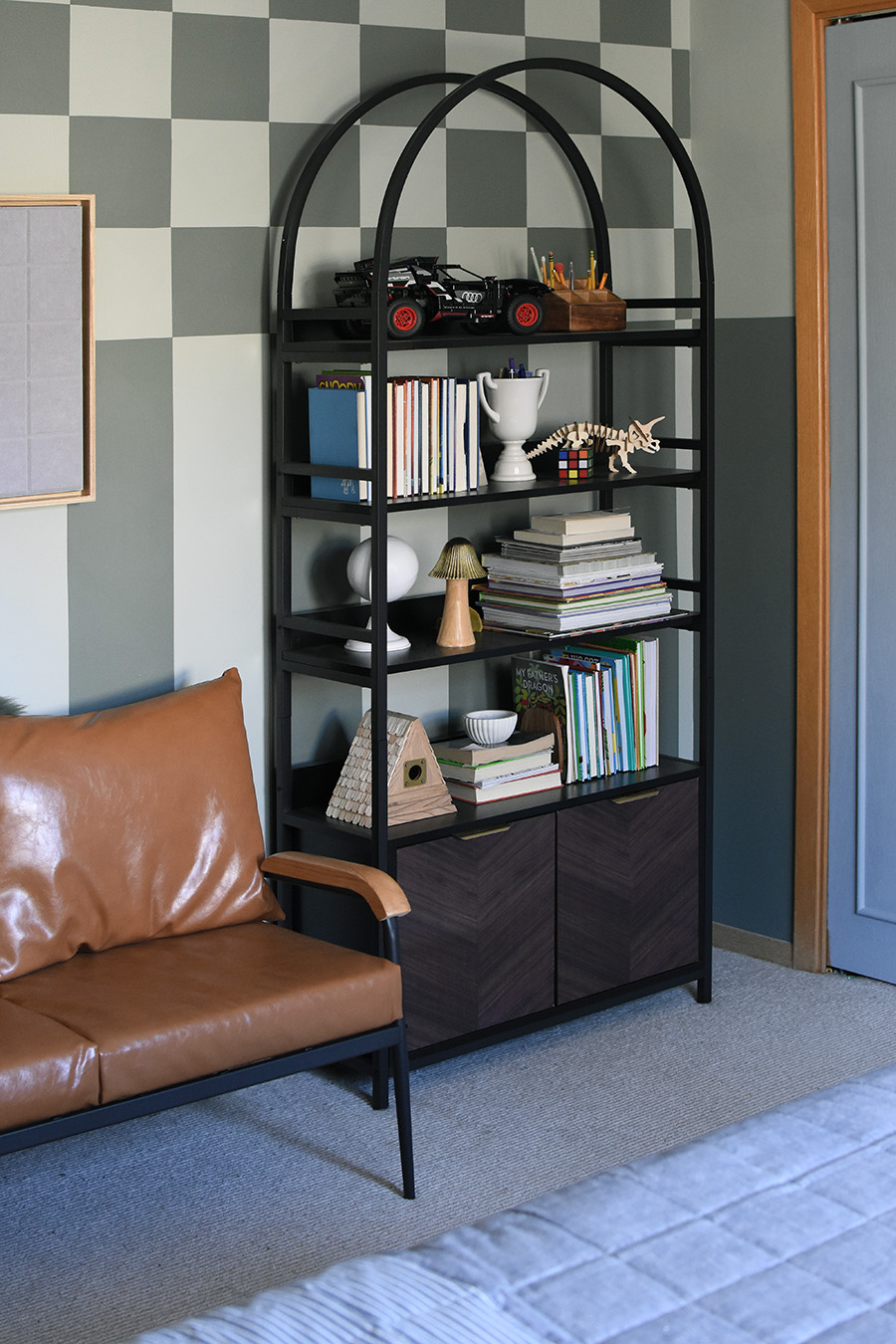 Arched Bookcase against checkered wall