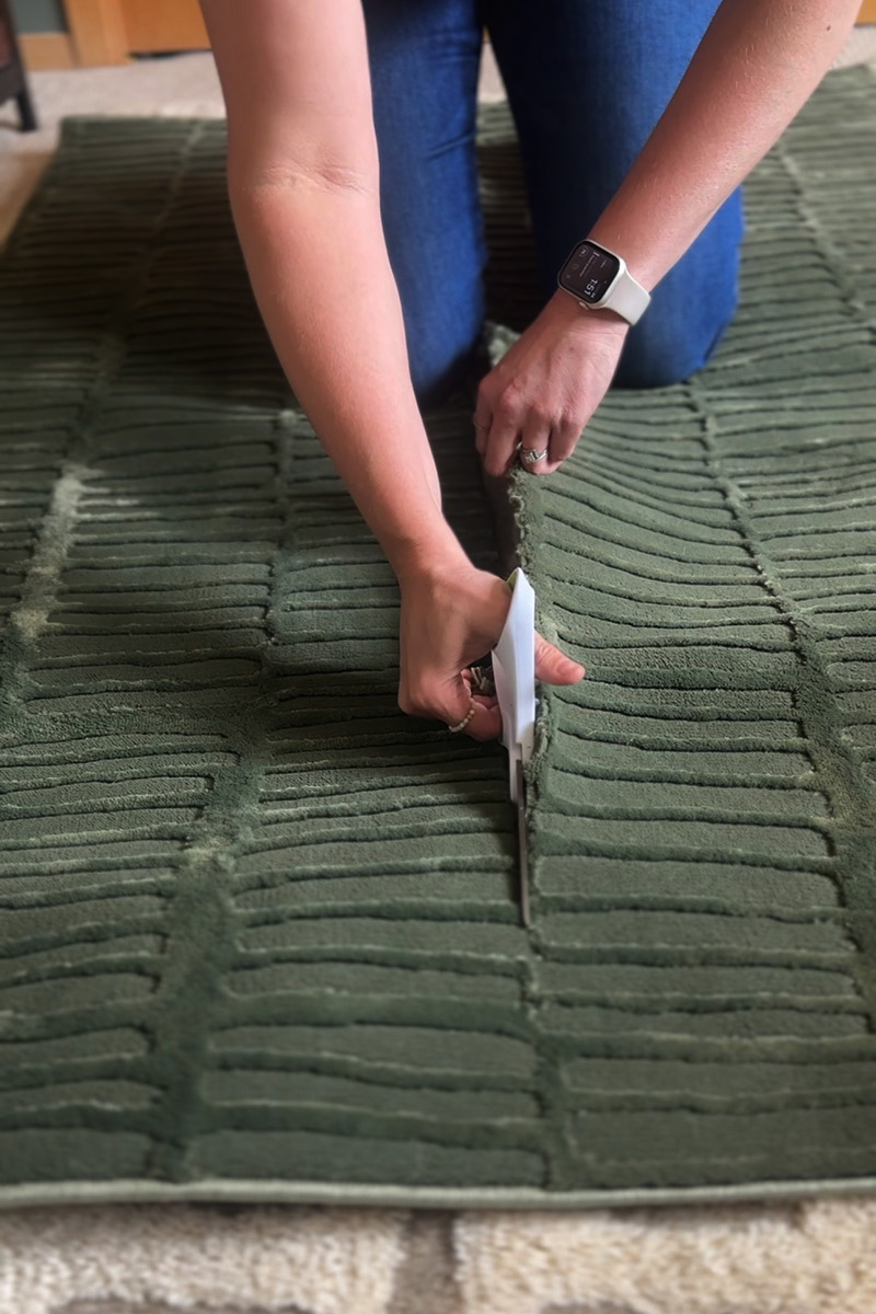 Cutting green rug
