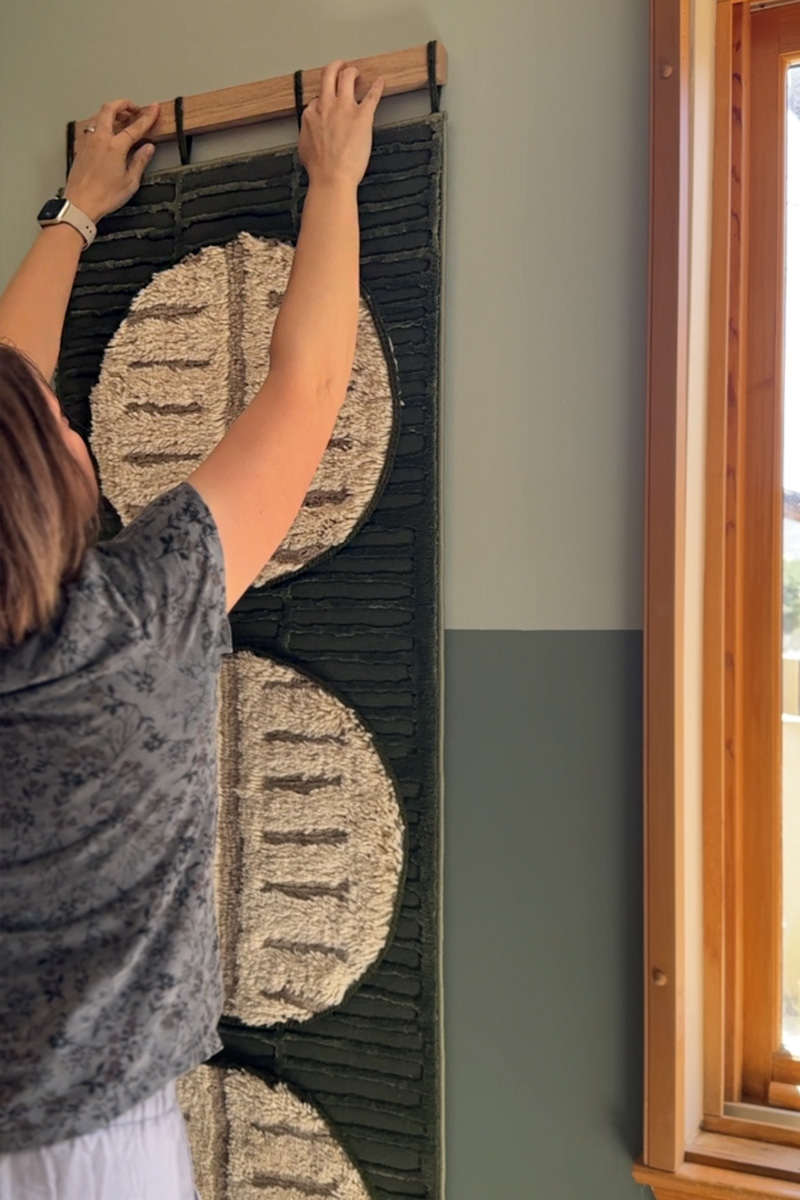 Hanging rug on wall