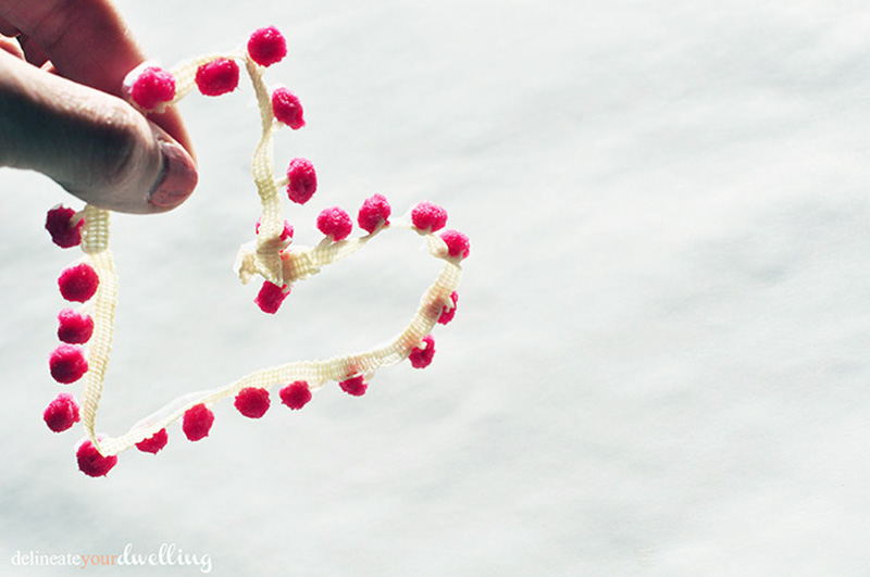 Pink pom pom ribbon heart