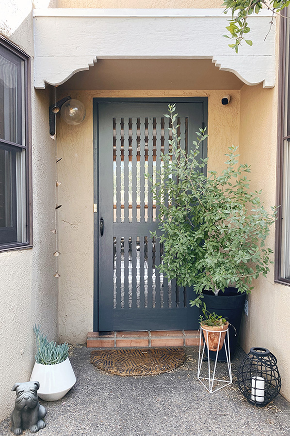 Repaired wooden front door screen